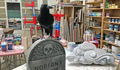 A raven on a tombstone